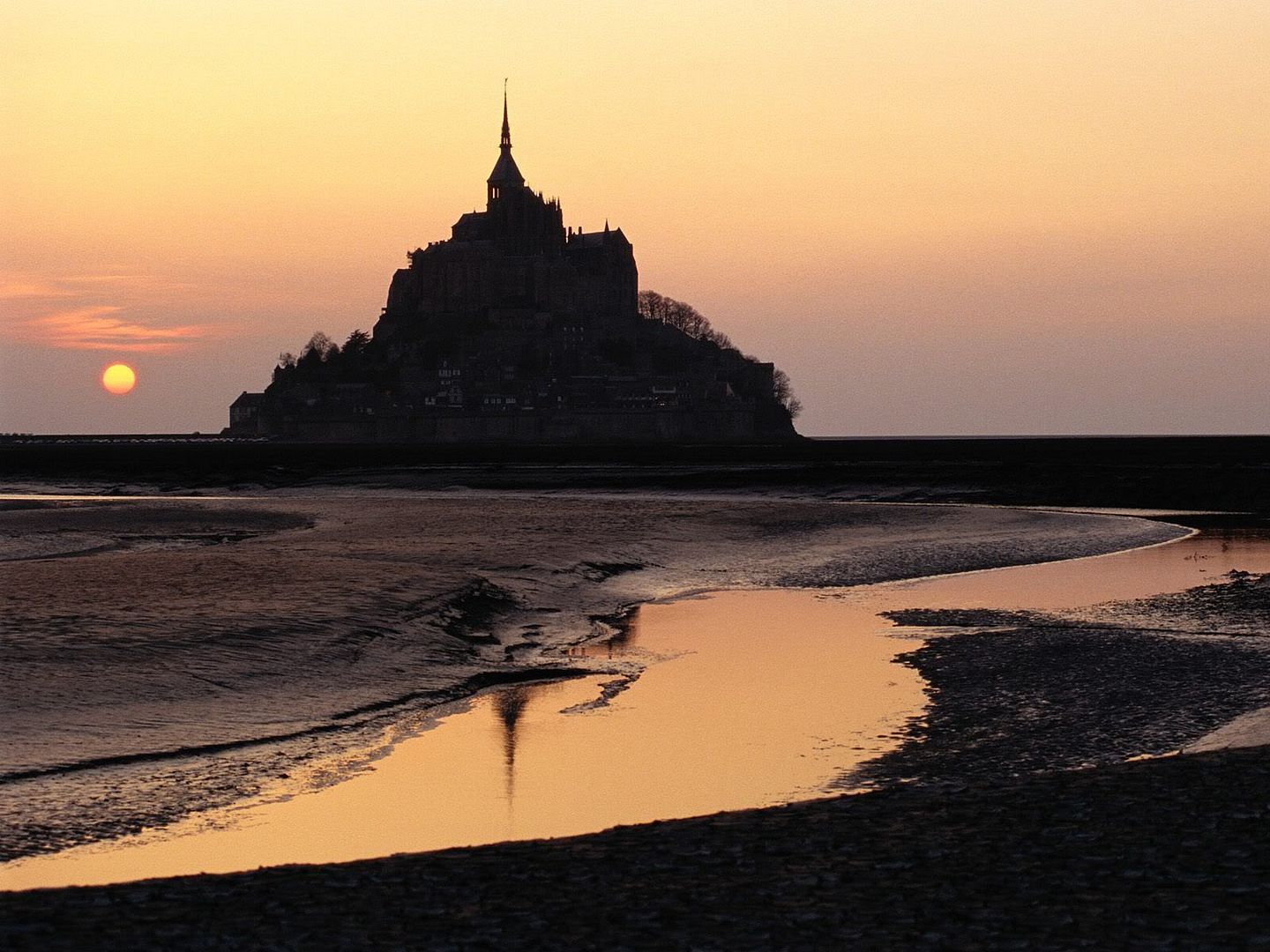 MontSaintMichelatSunsetNormandyFran.jpg