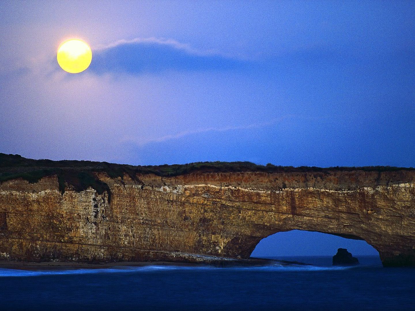 MoonRisingOverCliffsCalifornia.jpg