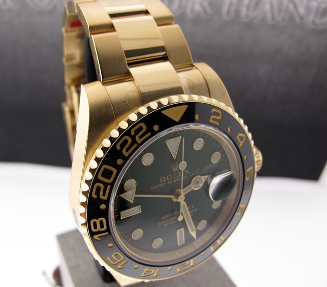 ROLEX GMT MASTER II 18K YELLOW GOLD GREEN DIAL CERAMIC BEZEL   116718 